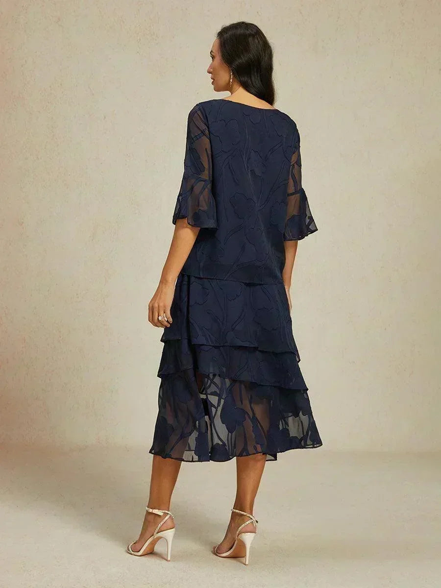 Elegant chiffon blouse with asymmetrical hem