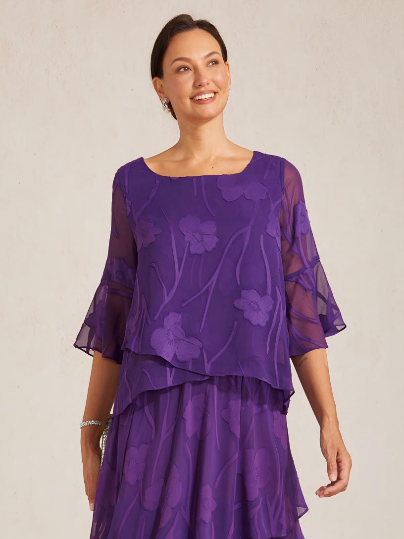 Elegant chiffon blouse with asymmetrical hem