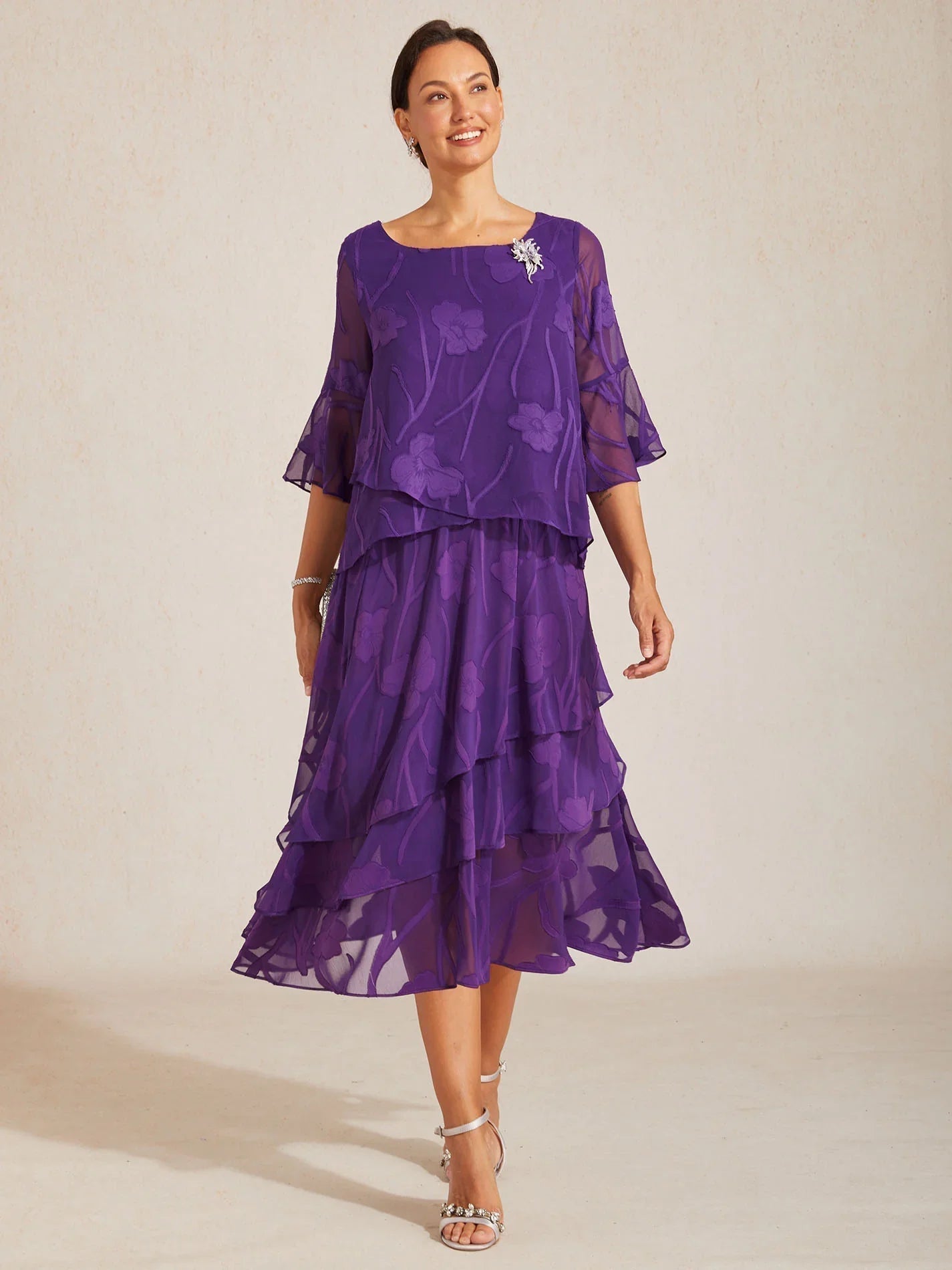 Elegant chiffon blouse with asymmetrical hem