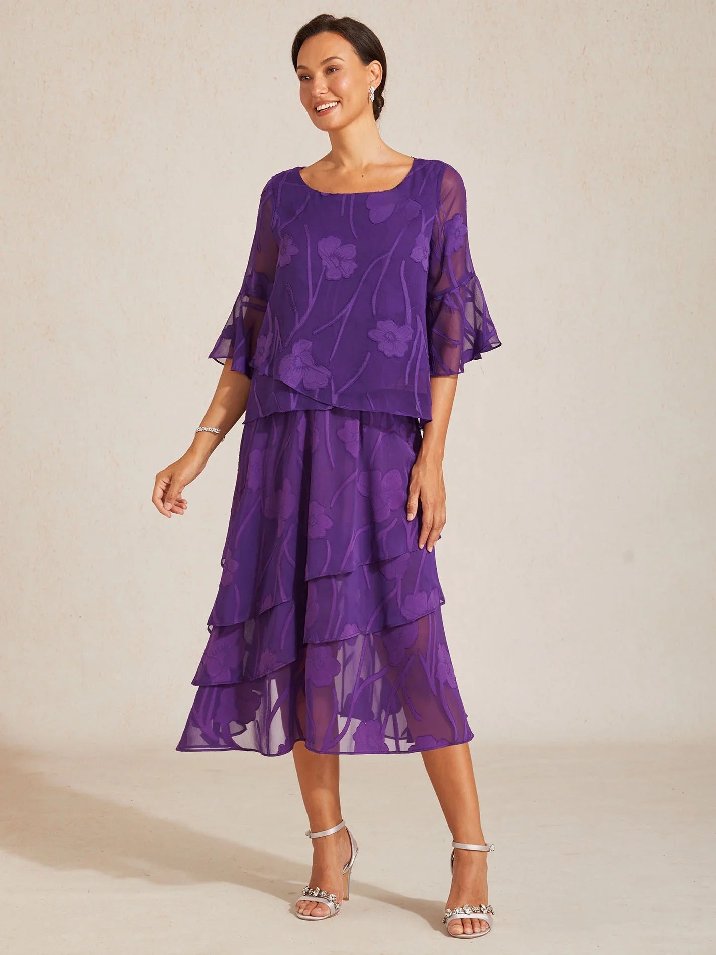Elegant chiffon blouse with asymmetrical hem