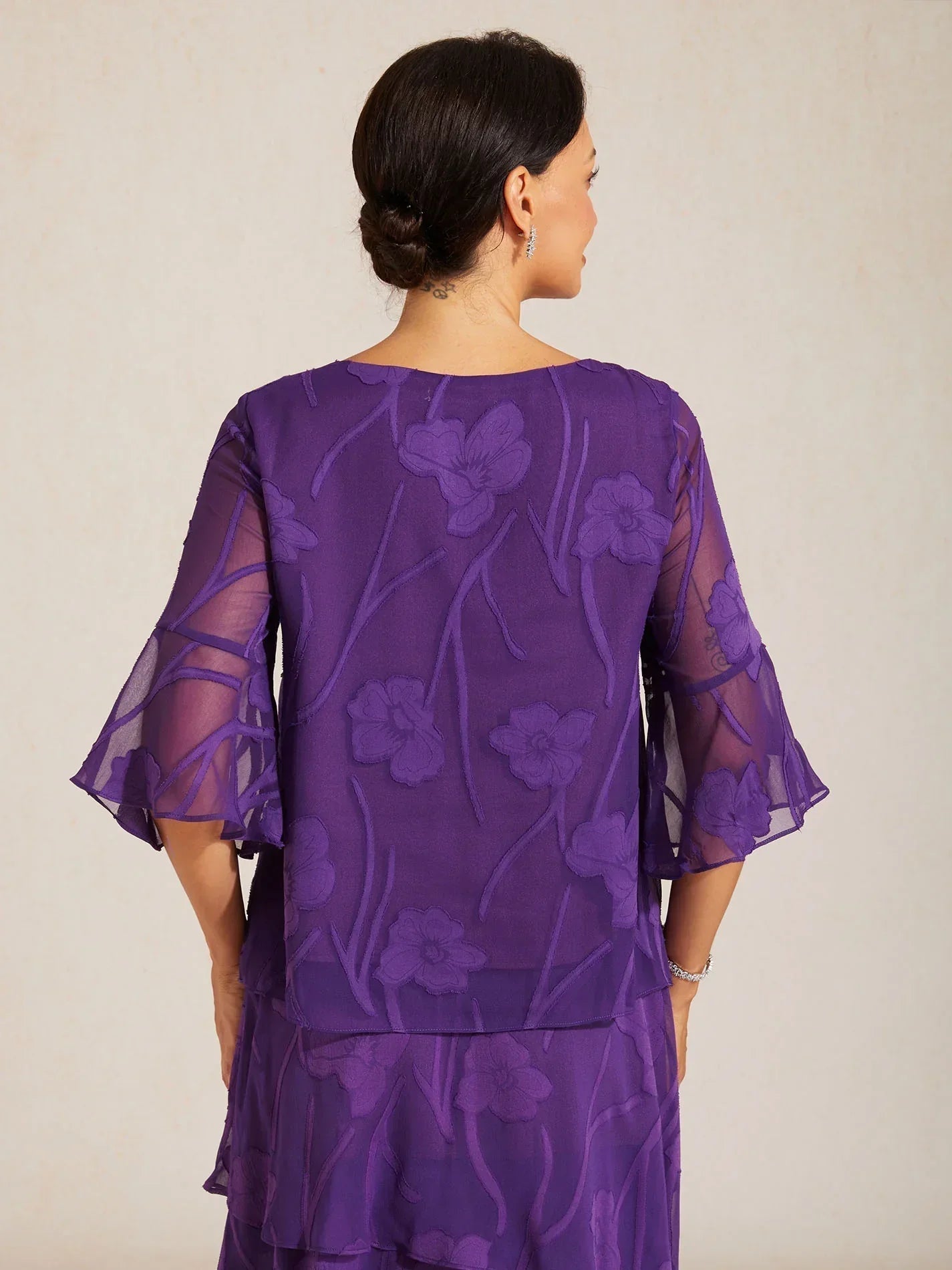 Elegant chiffon blouse with asymmetrical hem