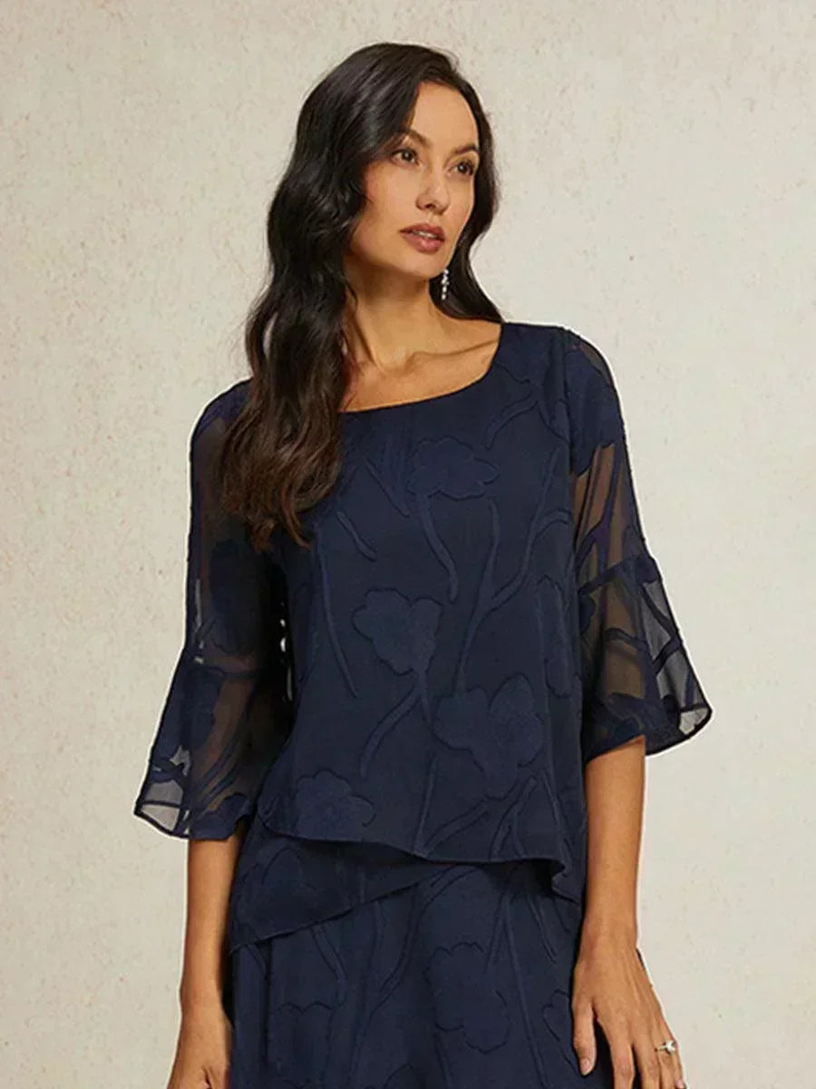 Elegant chiffon blouse with asymmetrical hem