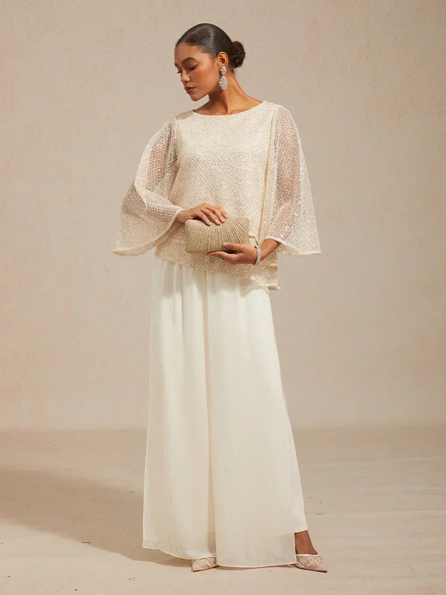 Layered mesh top with sequins and bell-shaped sleeves