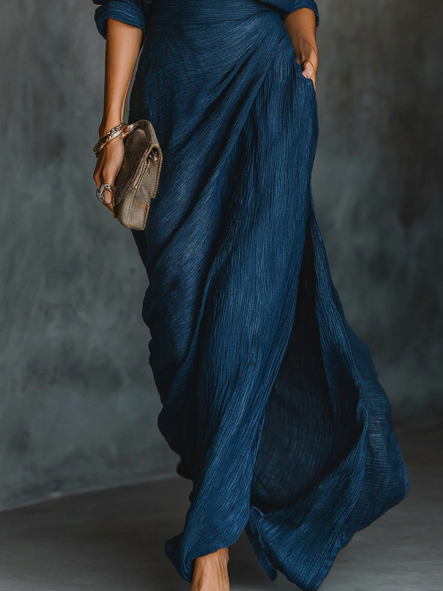 Set of long-sleeve shirt with collar and elegant pleated maxi skirt in a solid color