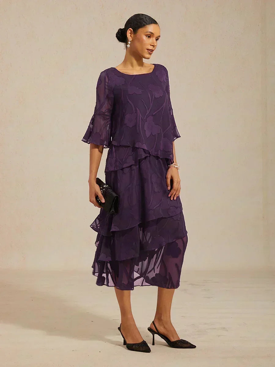 Elegant chiffon blouse with asymmetrical hem