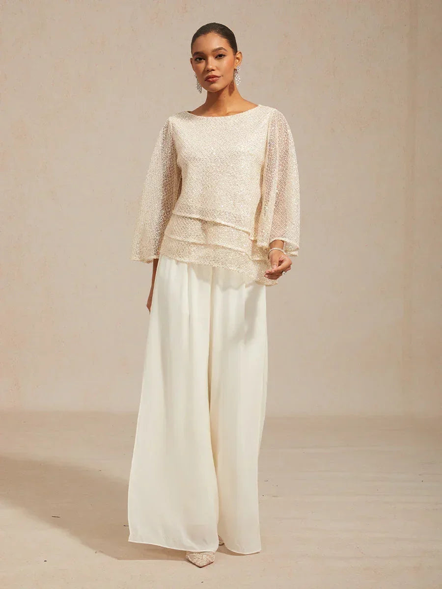 Layered mesh top with sequins and bell-shaped sleeves