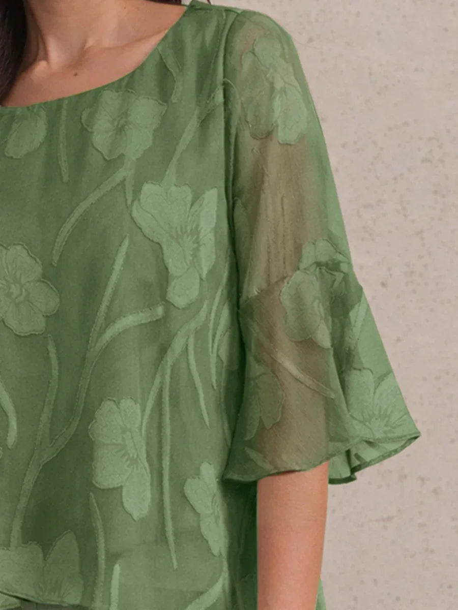 Elegant chiffon blouse with asymmetrical hem