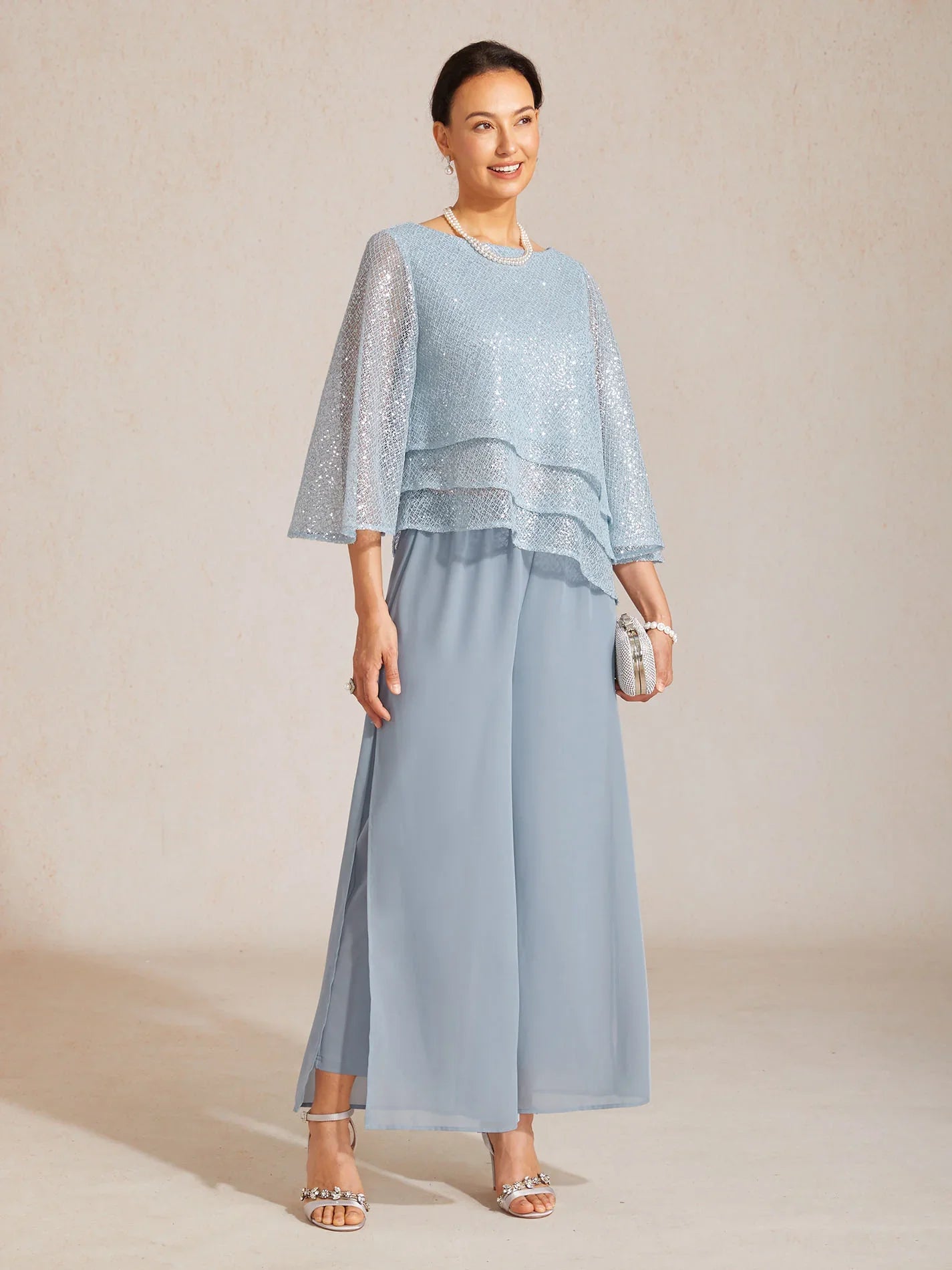 Layered mesh top with sequins and bell-shaped sleeves
