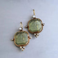 Vintage earrings with green crystal stone