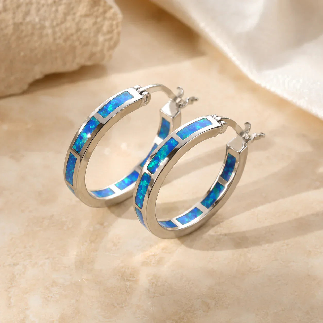Hello earrings with blue opal