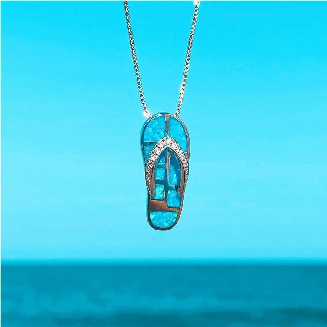 Silver flip-flop pendant necklace with blue opal