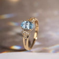 Luxury gold ring with blue crystal
