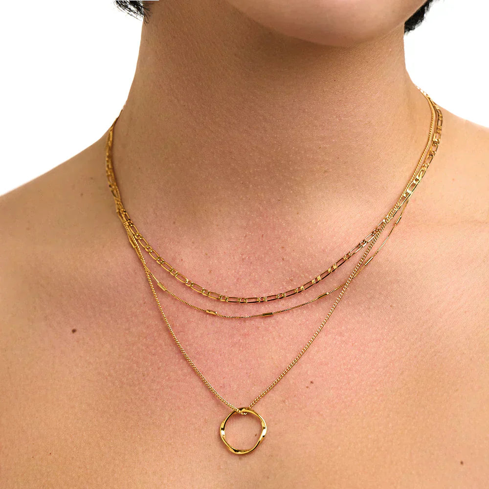 Open hoop bracelet in three rows of gold