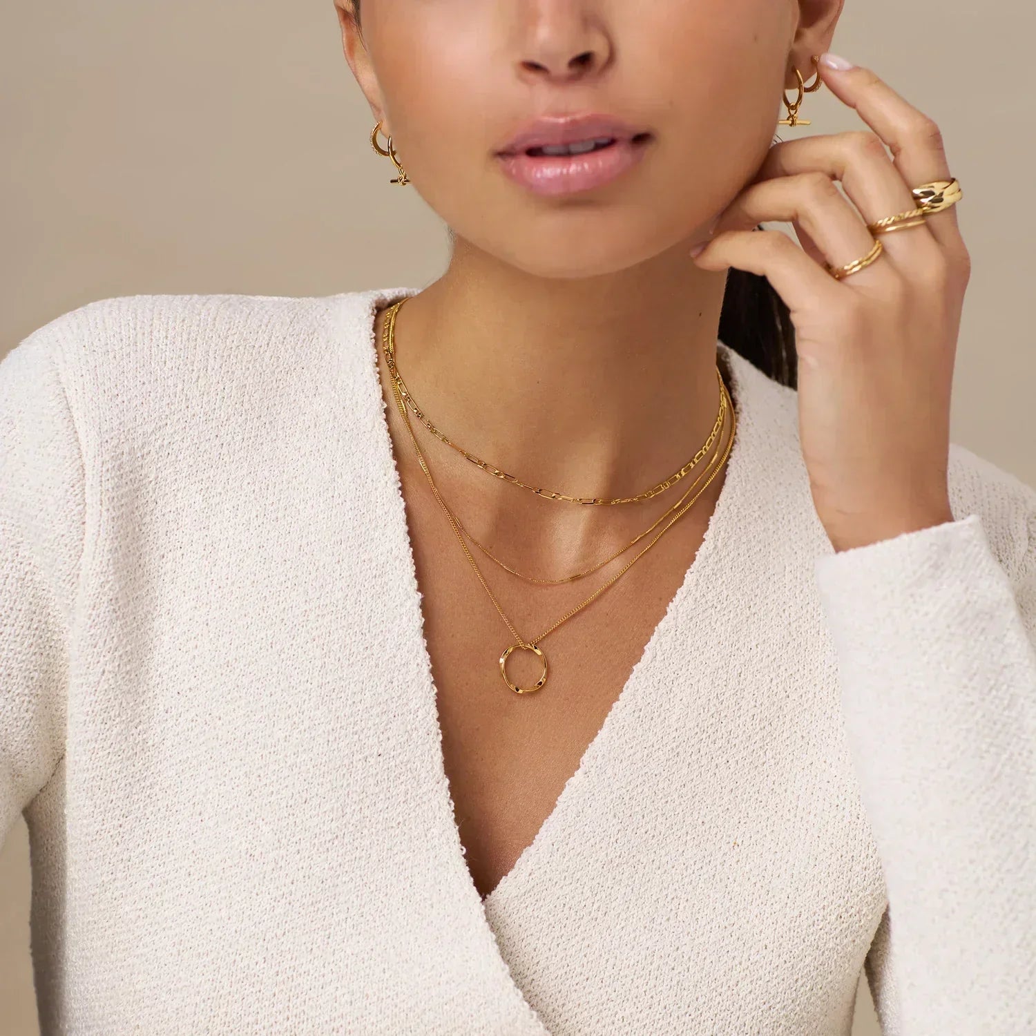 Open hoop bracelet in three rows of gold