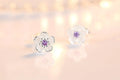 Flower-shaped stud earrings with zirconia
