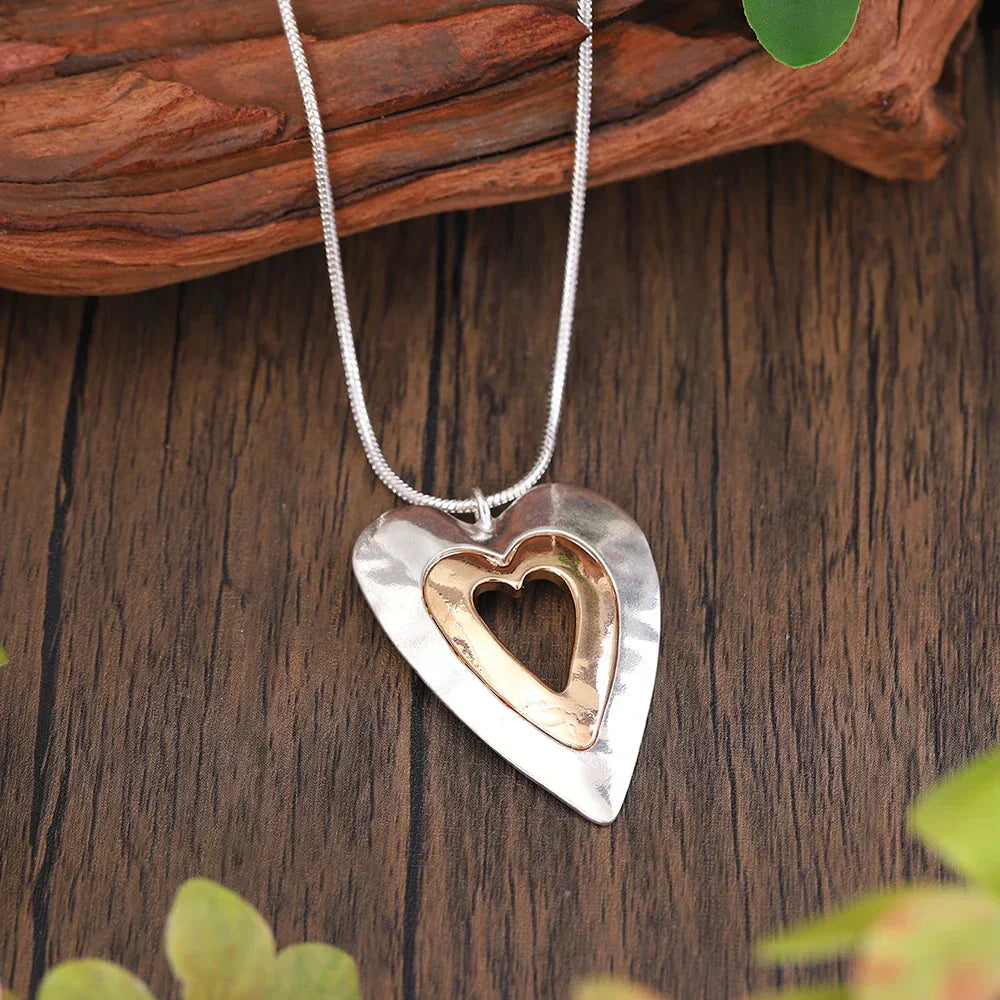 Valuable Vintage Heart Shaped Pendant in Silver and Gold