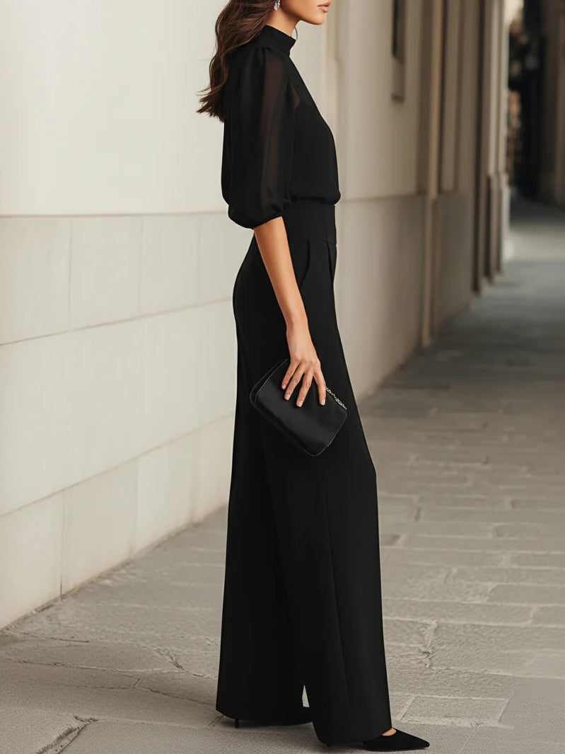 Valentina • A three-piece set in black, including a sheer camisole top and wide-leg pants