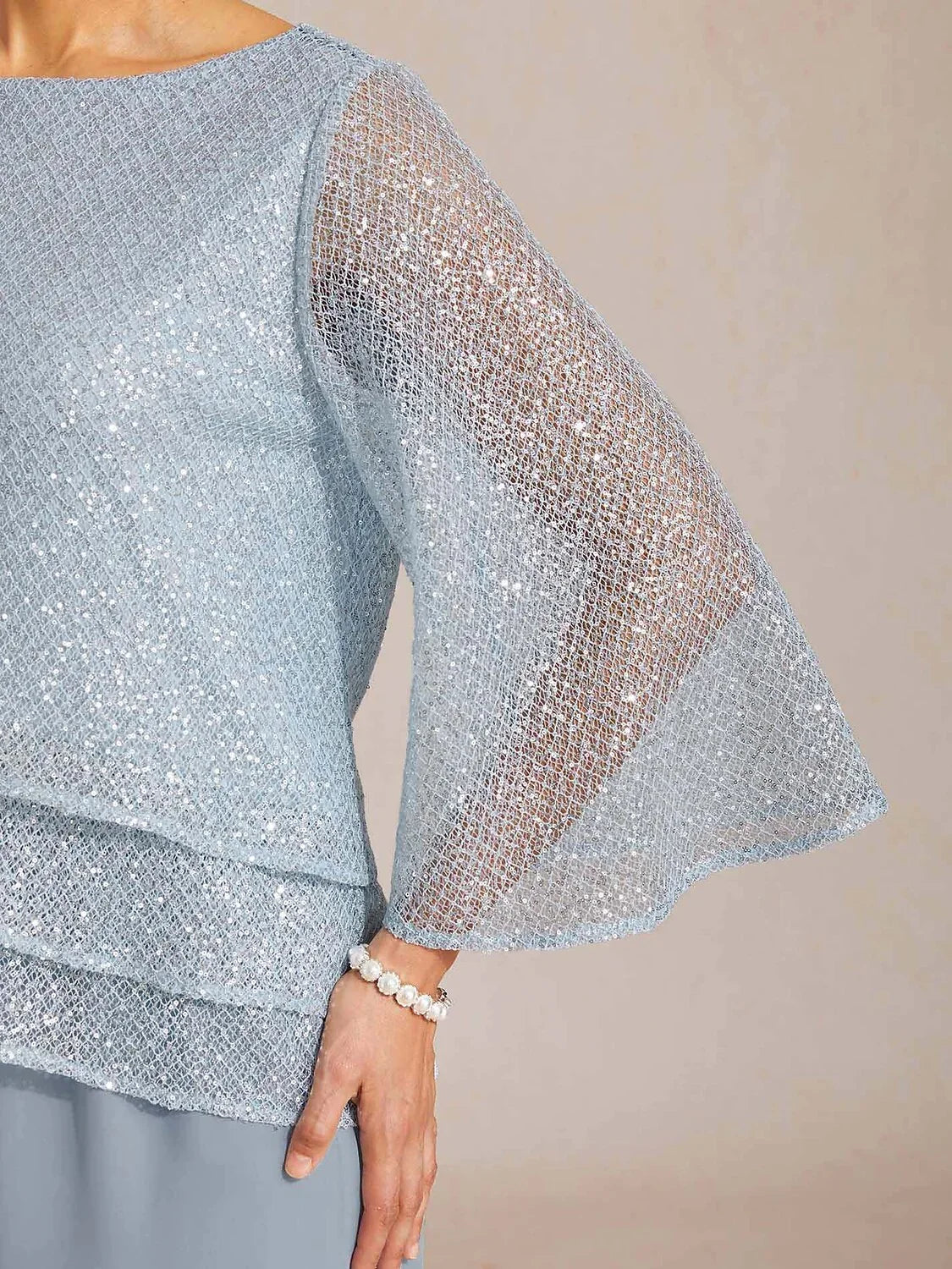 Layered mesh top with sequins and bell-shaped sleeves