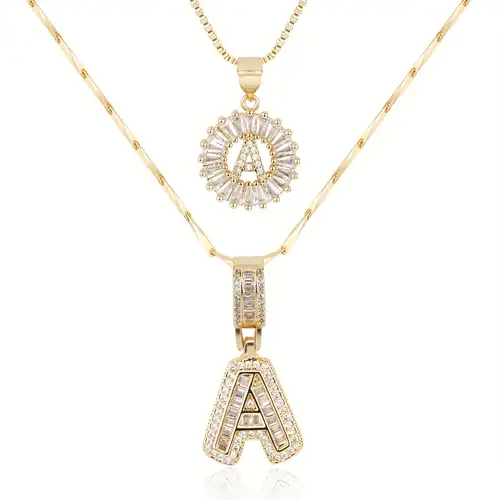 Set of pendants with initials in moissanite