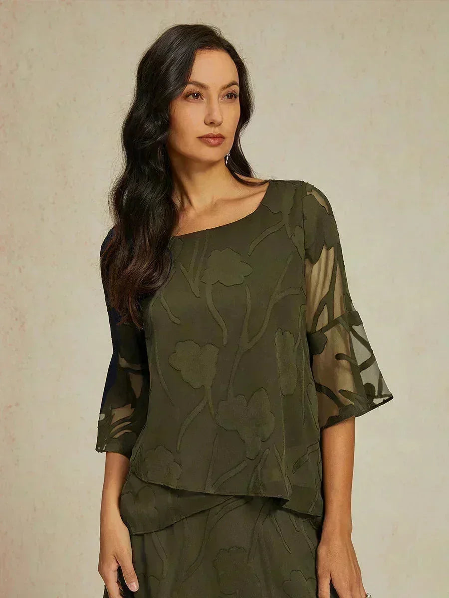 Elegant chiffon blouse with asymmetrical hem