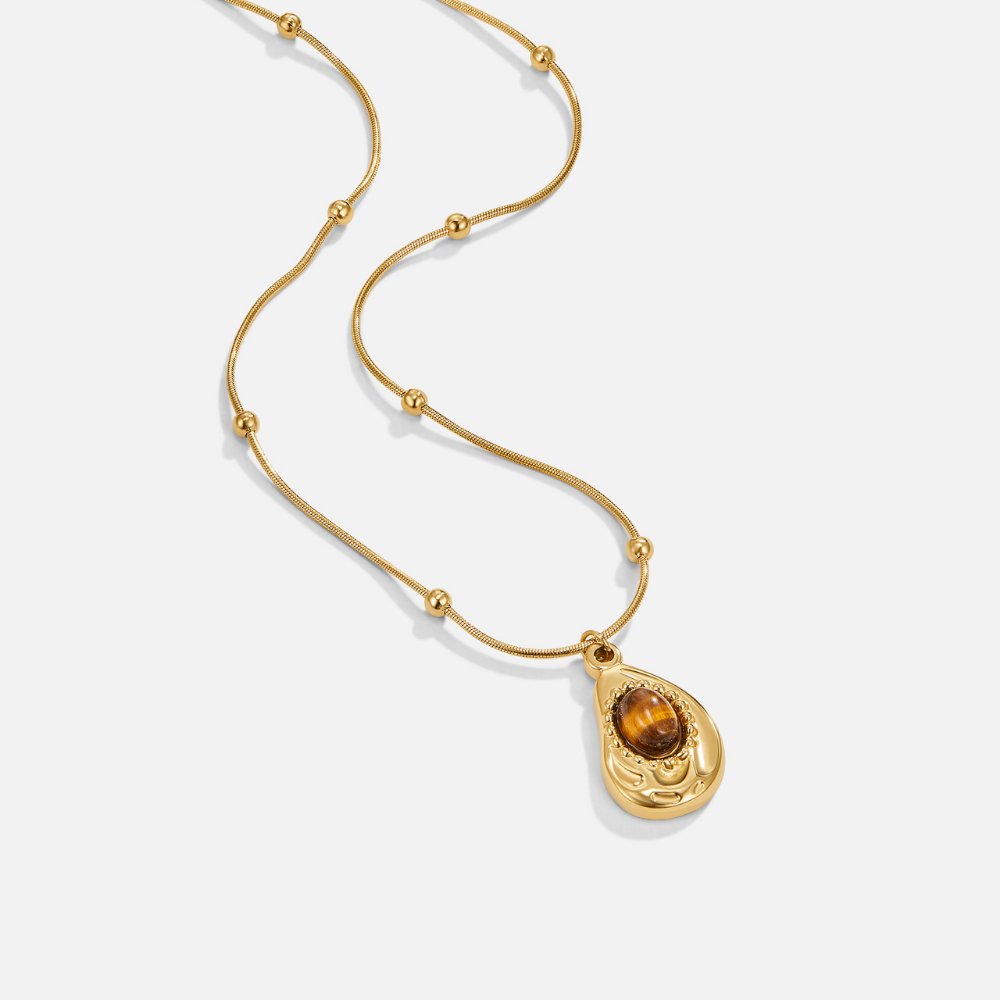 Elegant Gold Collar with Tiger Eye Stone